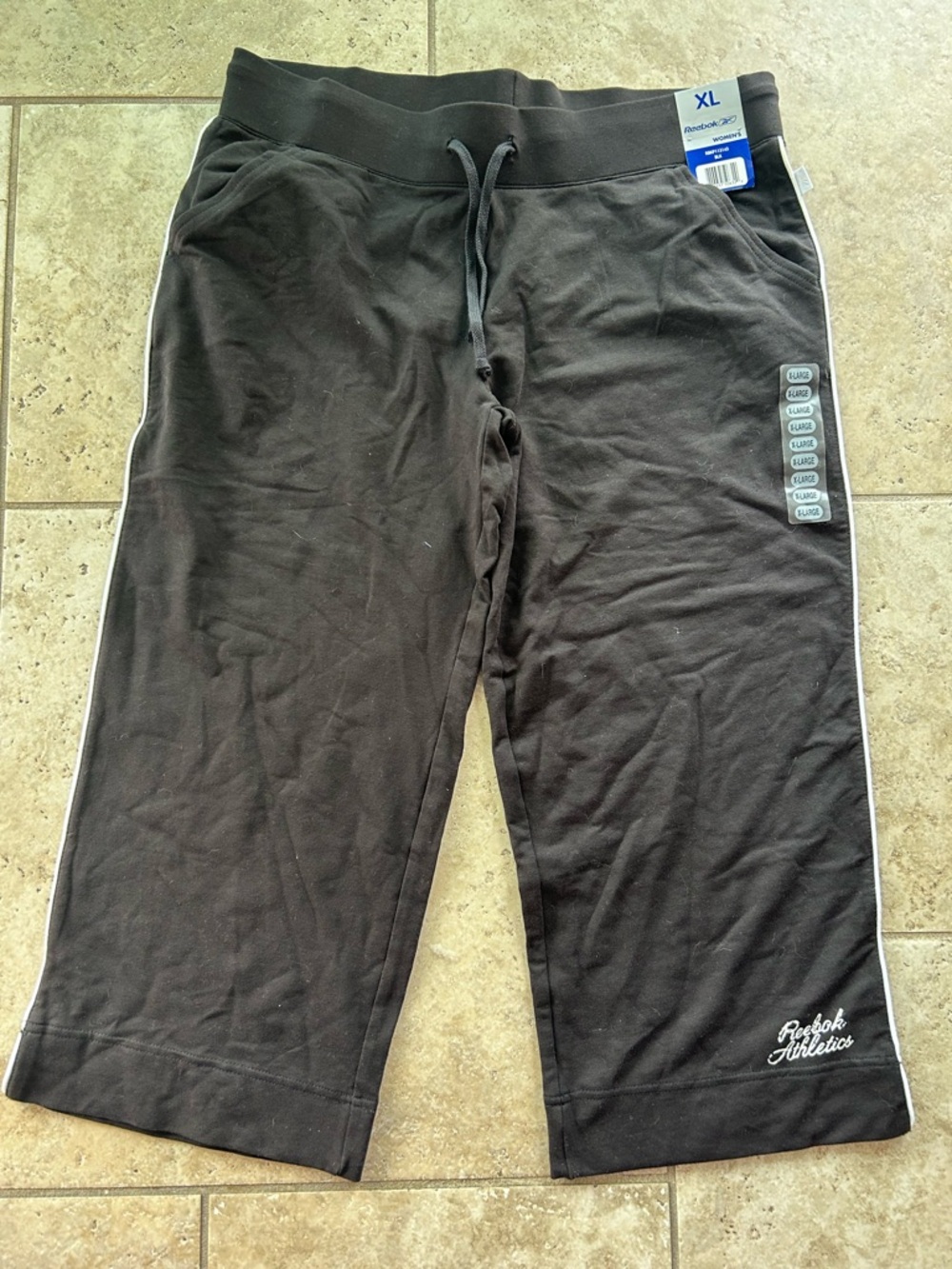 Reebok Black Sweatpants with White Script Logo